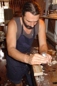 Ilja Grawert planes maple ribs for violin in his Brisbane, Australia based shop image #2