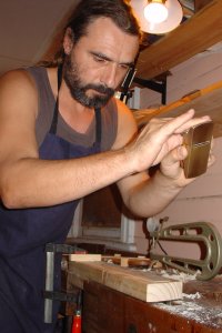Ilja Grawert works on handmade violin planing the ribs in his Woolloongabba Brisbane workshop for Violin, Viola, Cello and Double bass image #3