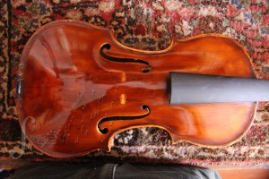 A violin after it has been cleaned in Ilja Grawert Violin shop in Brisbane