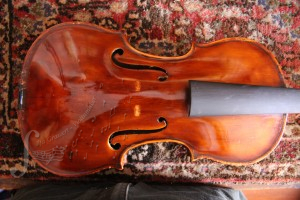 After A violin after it has been cleaned in Ilja Grawert Violin shop in Brisbane